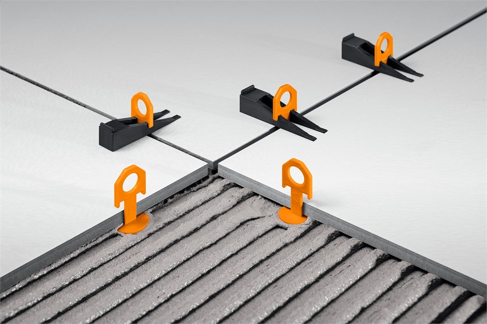 ЗУБР  СВП, комплект в пластиковом ведре: клин + зажим, 50 + 50 шт, система выравнивания плитки (3384-H50) 3384-H50